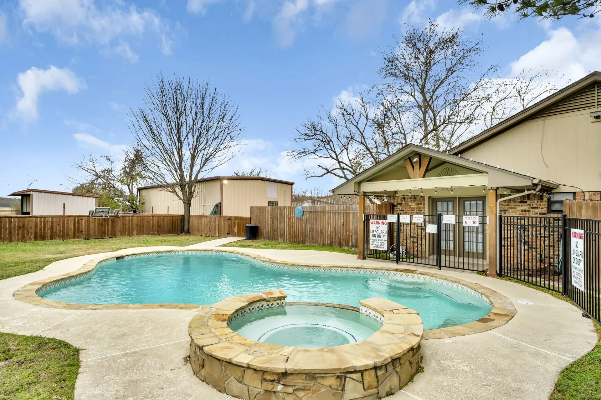 Outdoor swimming pool at Waggin' Tail Ranch RV Resort, Pilot Point, TX